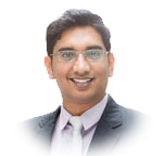 Portrait of confident 30s Asian Indian businessman smiling. India male business man, real modern office building as background.